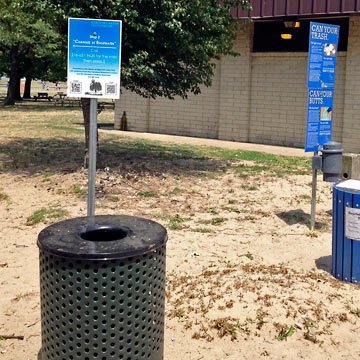 New trash can with sign