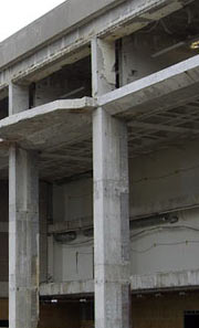 Exterior of CSU Main Classroom building showing section being demolished