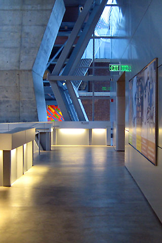Inside at Akron Art Museum, looking down corridor toward Sol LeWitt painting
