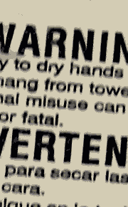 Hanging warning; netting - July 27, 2007 Towel dispenser hanging warning
