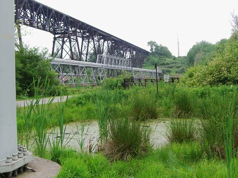 Short Line RR trestle bridge spanning Cuyahoga River valley, seen from park below