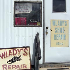 Wlady's Shoe Repair sign with hours listed