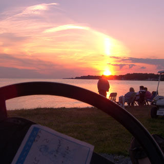 Sunset over downtown from the seat of the golf cart