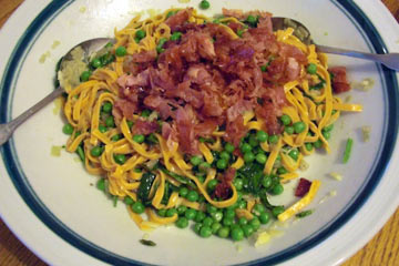 Peas and  pasta in bowl