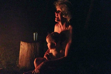 Joanne and Phoenix at campfire