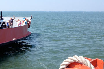 Waving goodbye from ferry