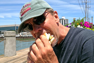 Al eating perch sandwich