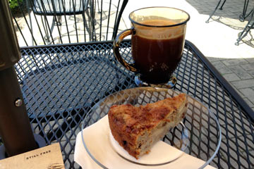 Coffee and pastry on table