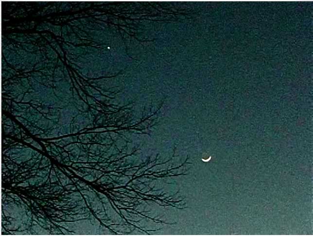 Sky with moon and single star