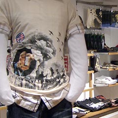 T-shirt showing bombers and peace sign, among other things