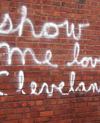 Graffiti saying "Show me love, Cleveland"