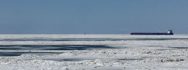 Freighter heading out on Lake Erie from Cleveland harbor