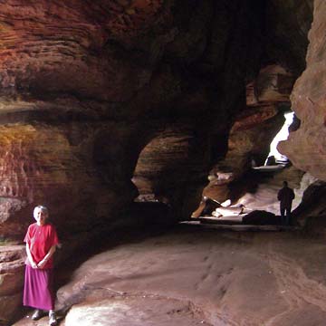 Joanne standing at entrance to Rock House, Hocking Hills State Park