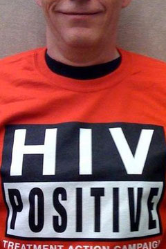 Person wearing a red HIV Positive shirt