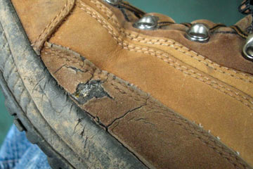 Close-up of boot showing cracked leather