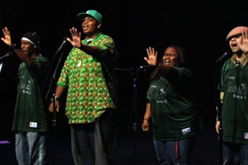 Poetry slam team on stage