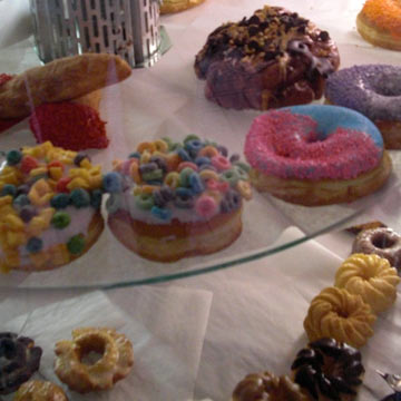 Variety of donuts on display, Voodoo Donuts, Portland, OR
