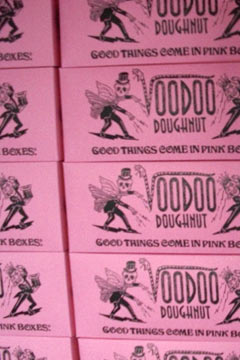 Stack of pink boxes at Voodoo donuts, Portland, OR