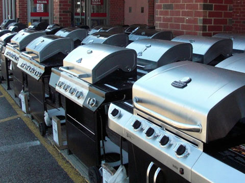 Row of barbeque grills in front of Lowe's