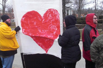 Large banner with heart on it.