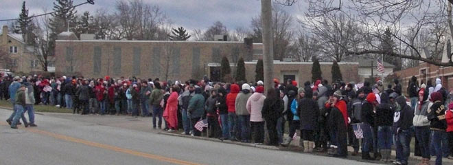 people lining the street for  Chardon student's funeral