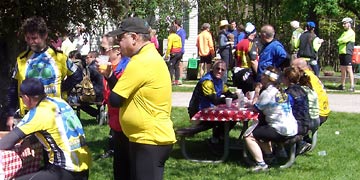 Group of cyclists dressed in colorful garb