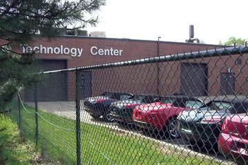 Saturn Skys parked outside of Auto Tech building