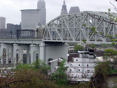 Ore carrier American Republic passes under a bridge on the Cuyahoga River in Cleveland's Flats