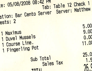 Restaurant receipt showing beer and pizza order