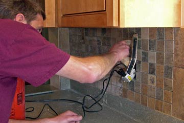 Ralph grouting backsplash tile