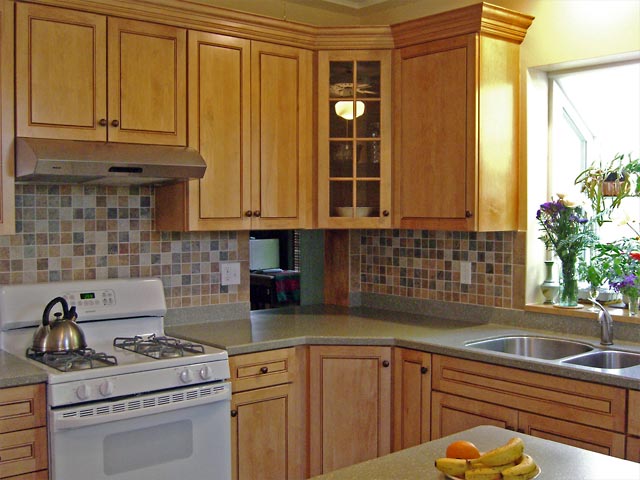 Kitchen with new counters, cabinets and backsplash