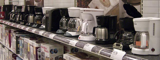 Shelf filled with electric coffeemakers at Target