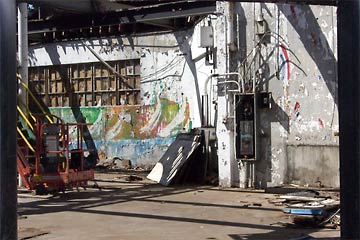 Gutted interior of Coast Guard station boat house.