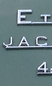 Detail of letter on trunk of Jaguar XK-E