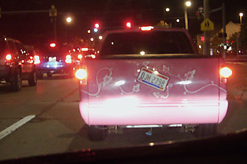 PInk custom truck at night