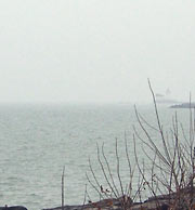 Lake, horizon, looking towards harbor lighthouse