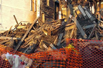 Wreckage of burned house on 32nd Street.
