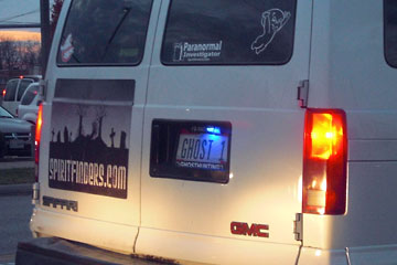White van with "Ghost 1" license plate