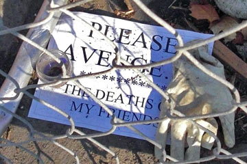 Sign that says Avenge the Deaths of my friends