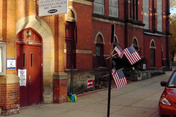 American flags on pole outside of polling place