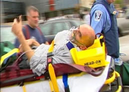 David being taken on a stretcher after school shooting
