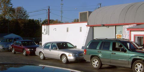 Cars in line at East Coast Custard drive-through