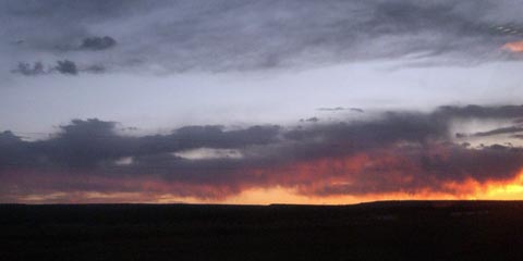 Orange and blue sky with clouds, just after sunset