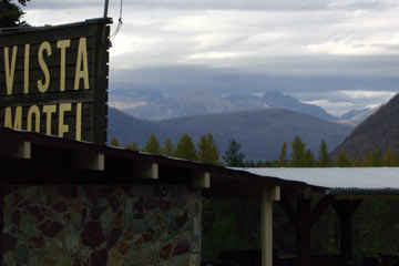 Vista Motel sign and view of mountains beyond