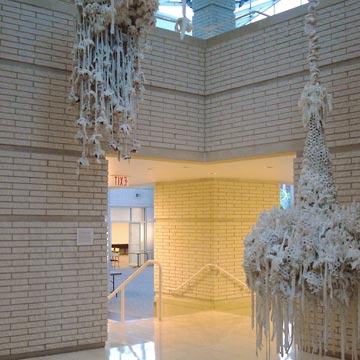 White sculptural chaneliers in Progressive headquarters