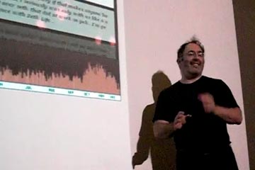 Golan Levin in front of screen during lecture at University of Akron