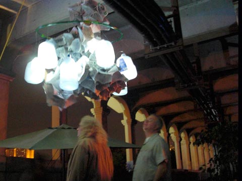Funky chandelier made of newpaper and plastic milk jugs