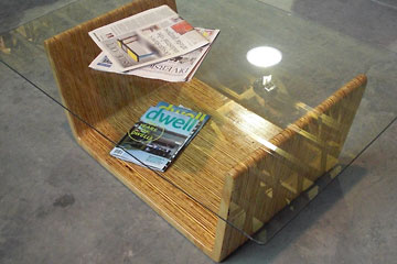 Laminated wood table with glass top