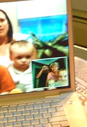 iChat in action - Sept. 1, 2007 Some of the family looking at laptop