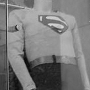 Superman in old uniform, no color